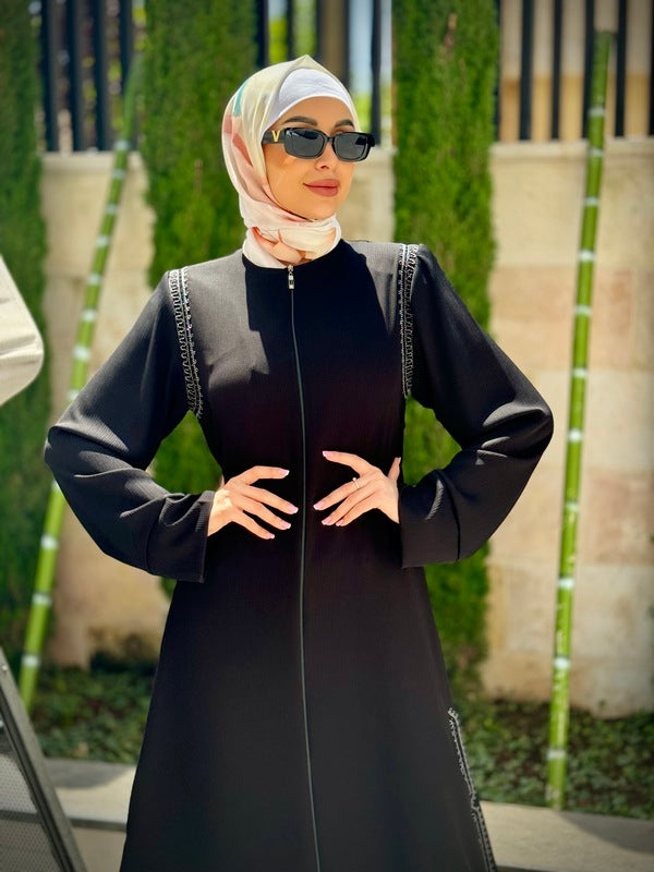 
                      
                        Elegant and Practical Black Abaya
                      
                    