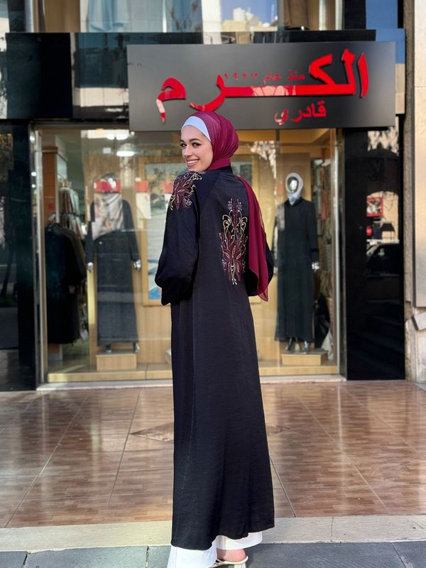 
                  
                    Black Abaya with Chic Embroidery
                  
                