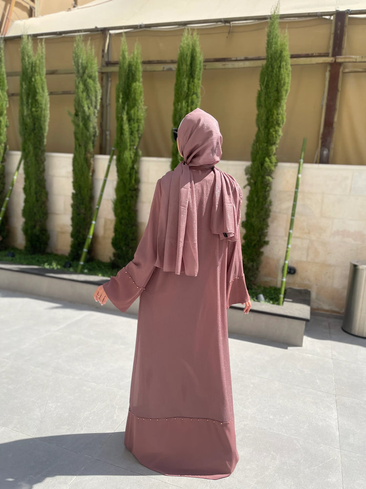 
                  
                    Colorful Two-Piece Abaya Set - A Symphony of Elegance and Versatility
                  
                