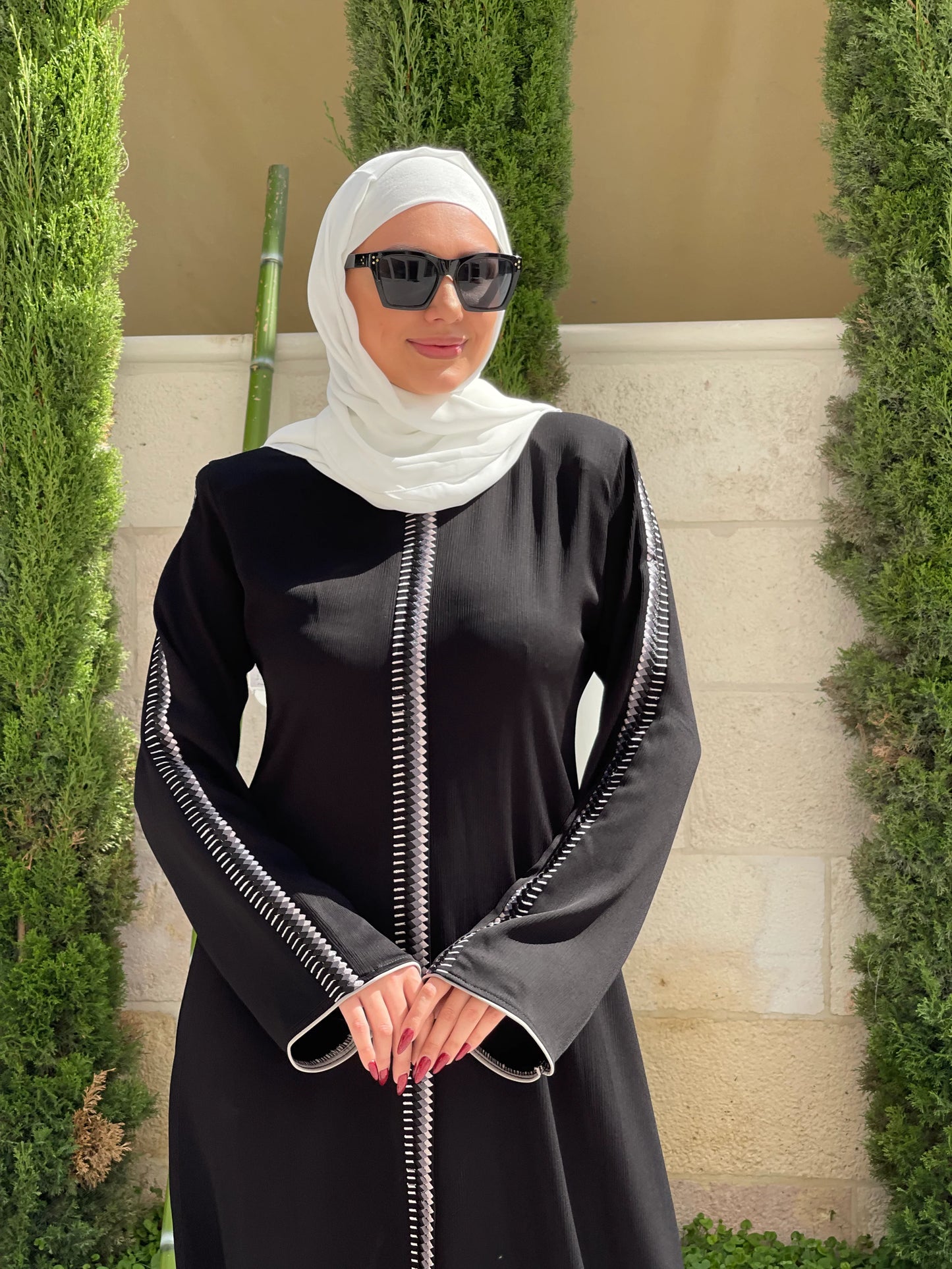 
                  
                    Artistry in Simplicity: Abaya with Front Embroidery and Zipper Closure
                  
                