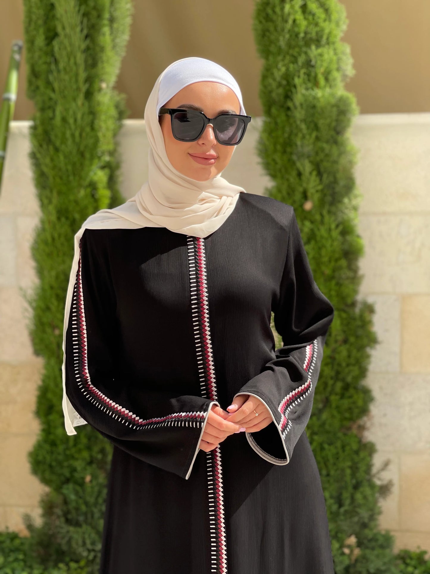 
                  
                    Artistry in Simplicity: Abaya with Front Embroidery and Zipper Closure
                  
                
