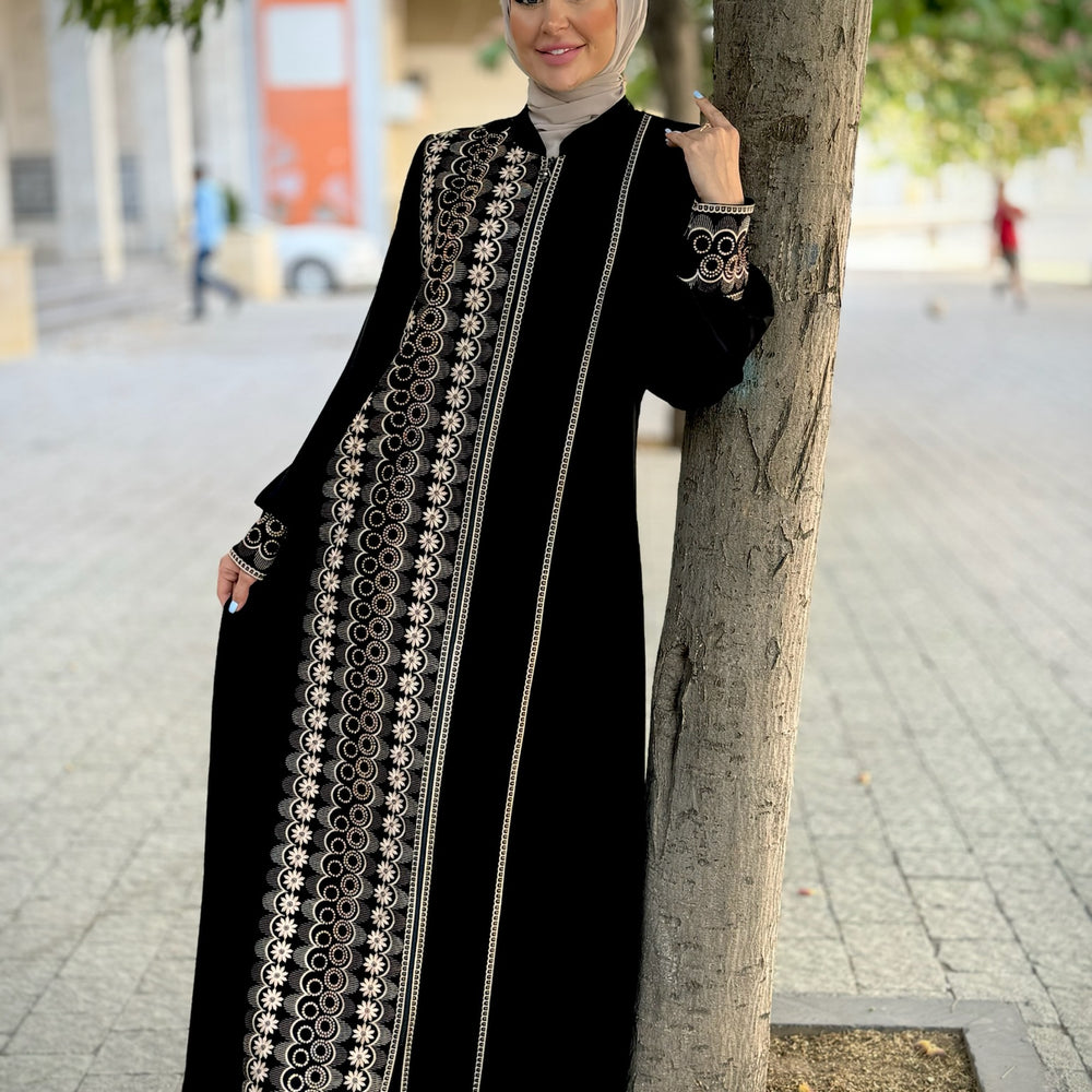 
                      
                        Black abaya with modern embroidery
                      
                    