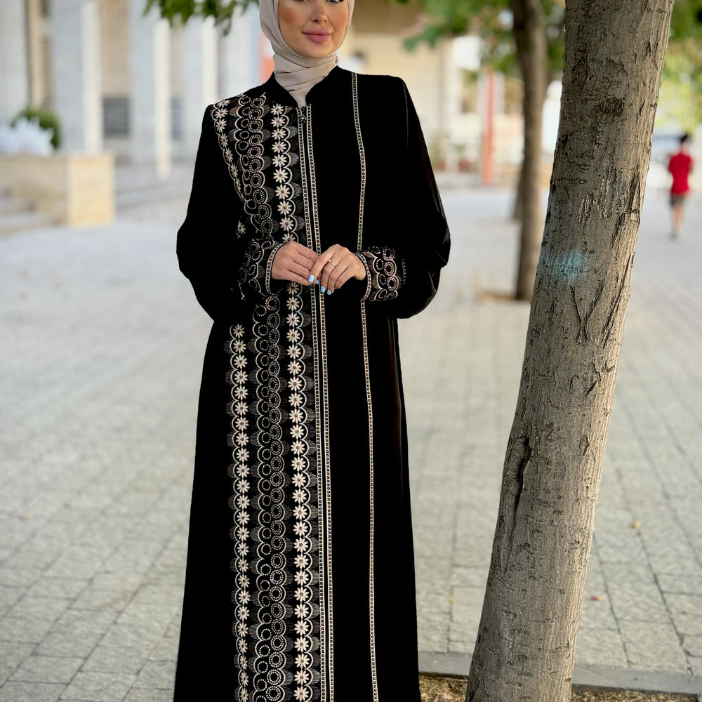 
                      
                        Black abaya with modern embroidery
                      
                    