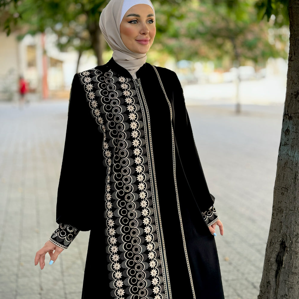 
                      
                        Black abaya with modern embroidery
                      
                    