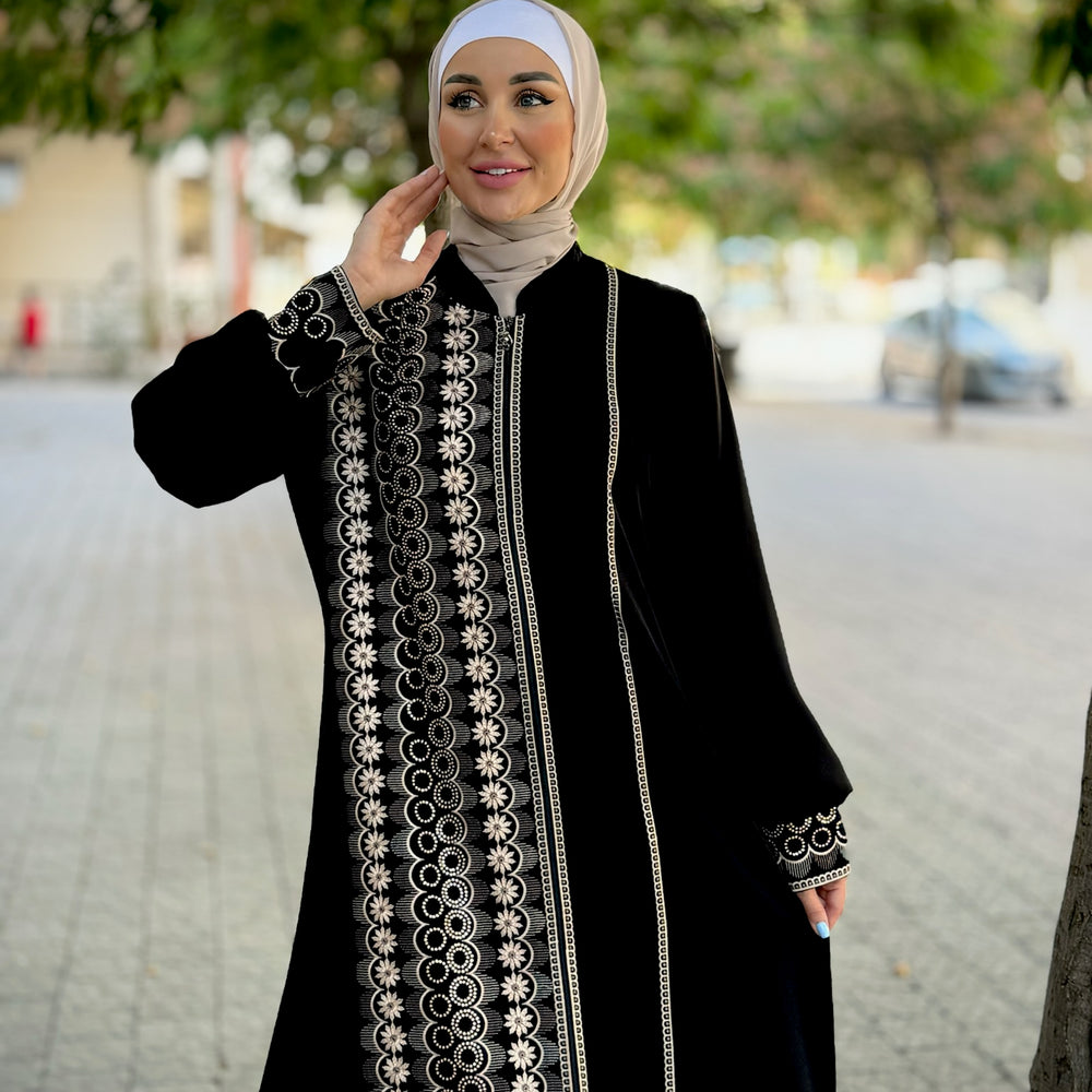 
                      
                        Black abaya with modern embroidery
                      
                    