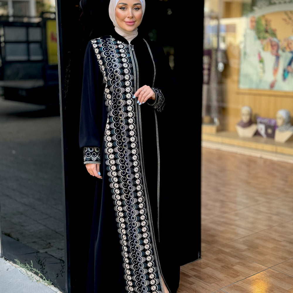 
                      
                        Black abaya with modern embroidery
                      
                    