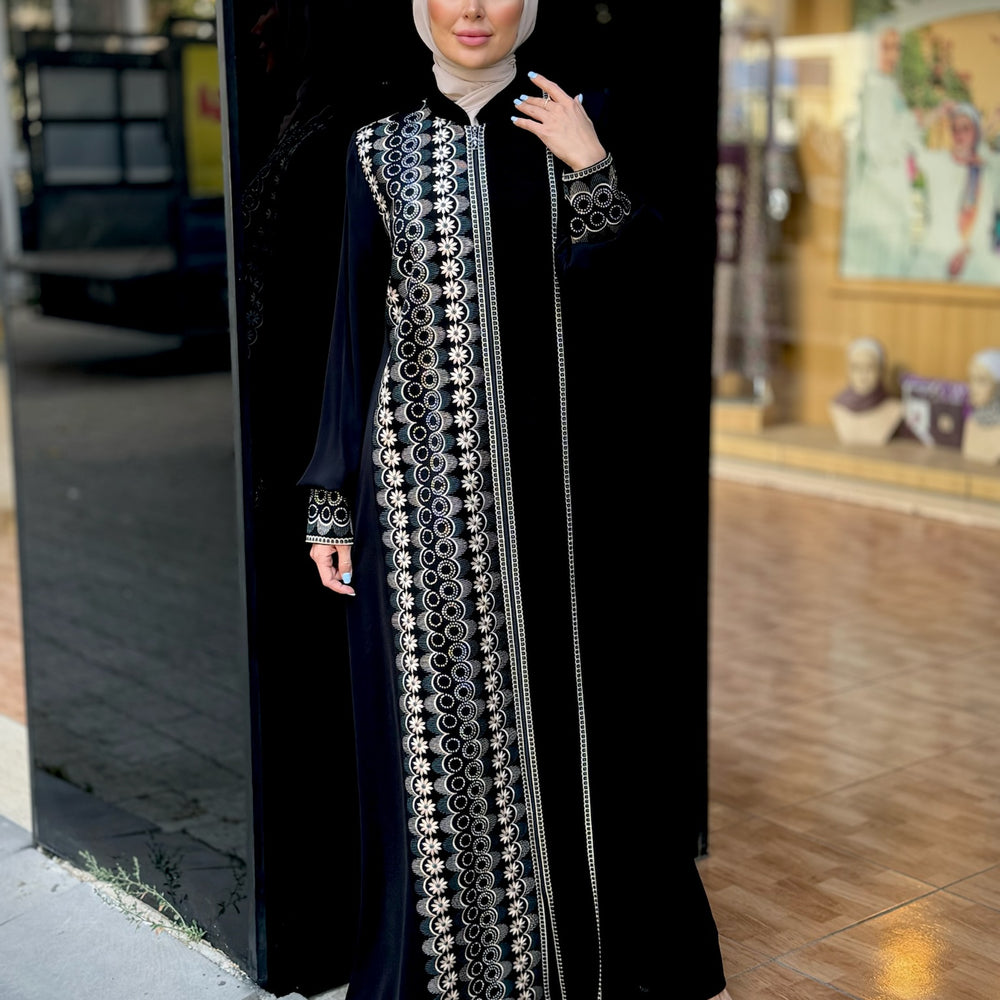 
                      
                        Black abaya with modern embroidery
                      
                    