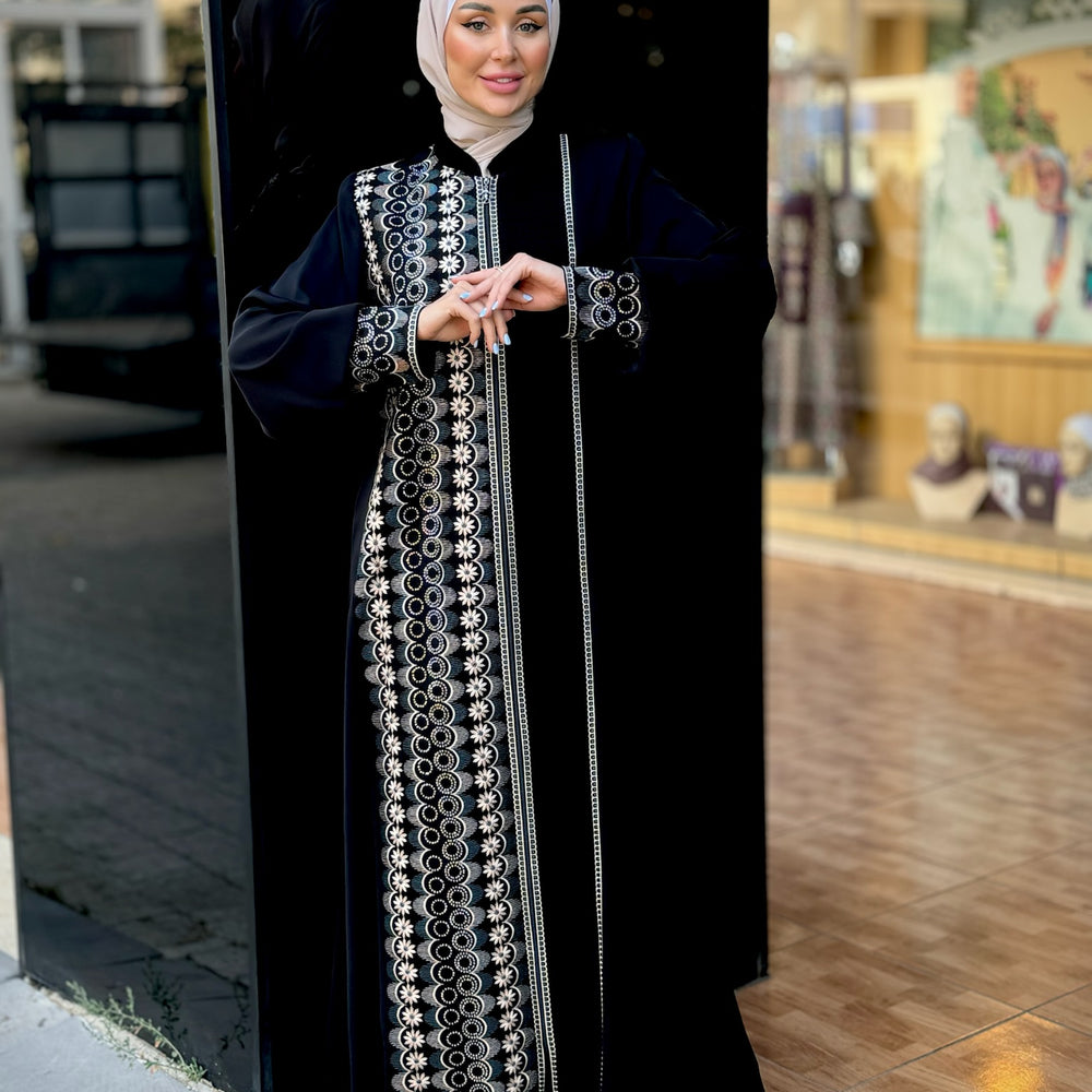 
                      
                        Black abaya with modern embroidery
                      
                    