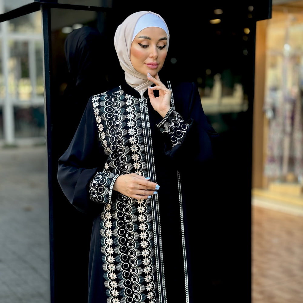 
                      
                        Black abaya with modern embroidery
                      
                    