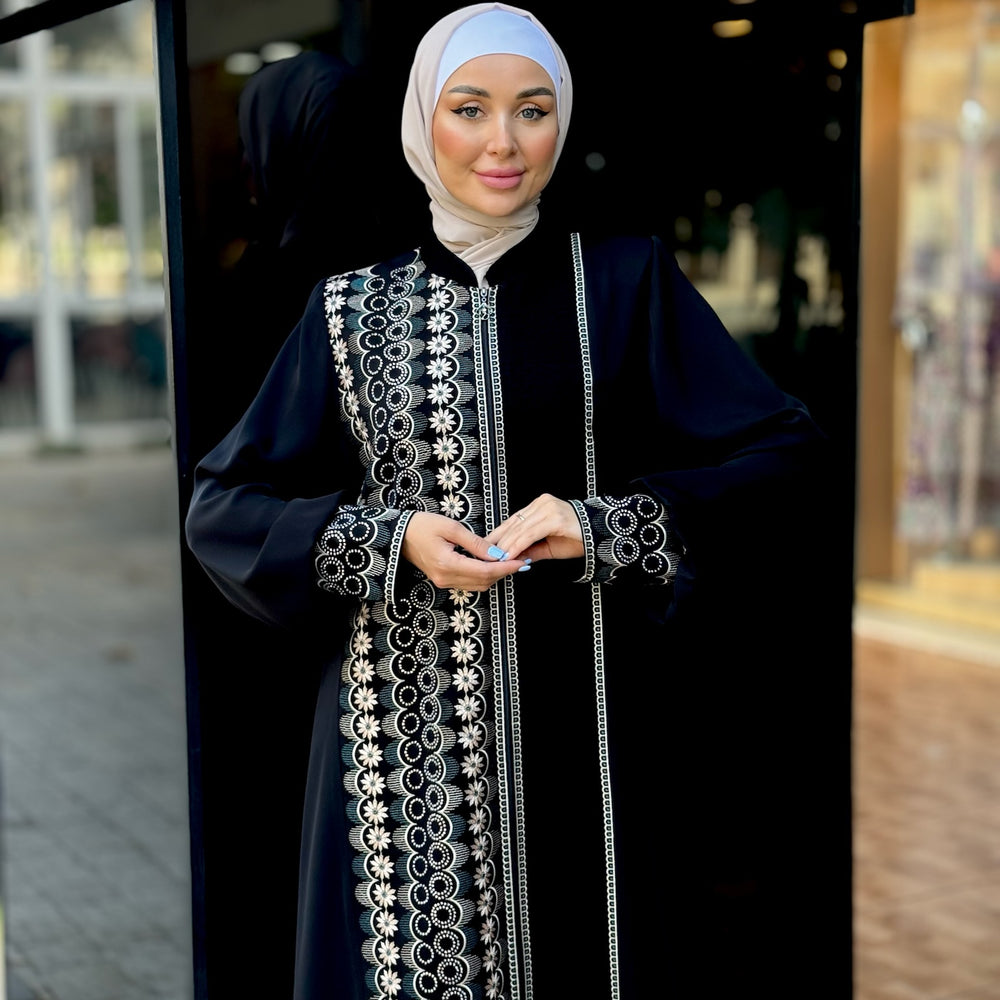 
                      
                        Black abaya with modern embroidery
                      
                    