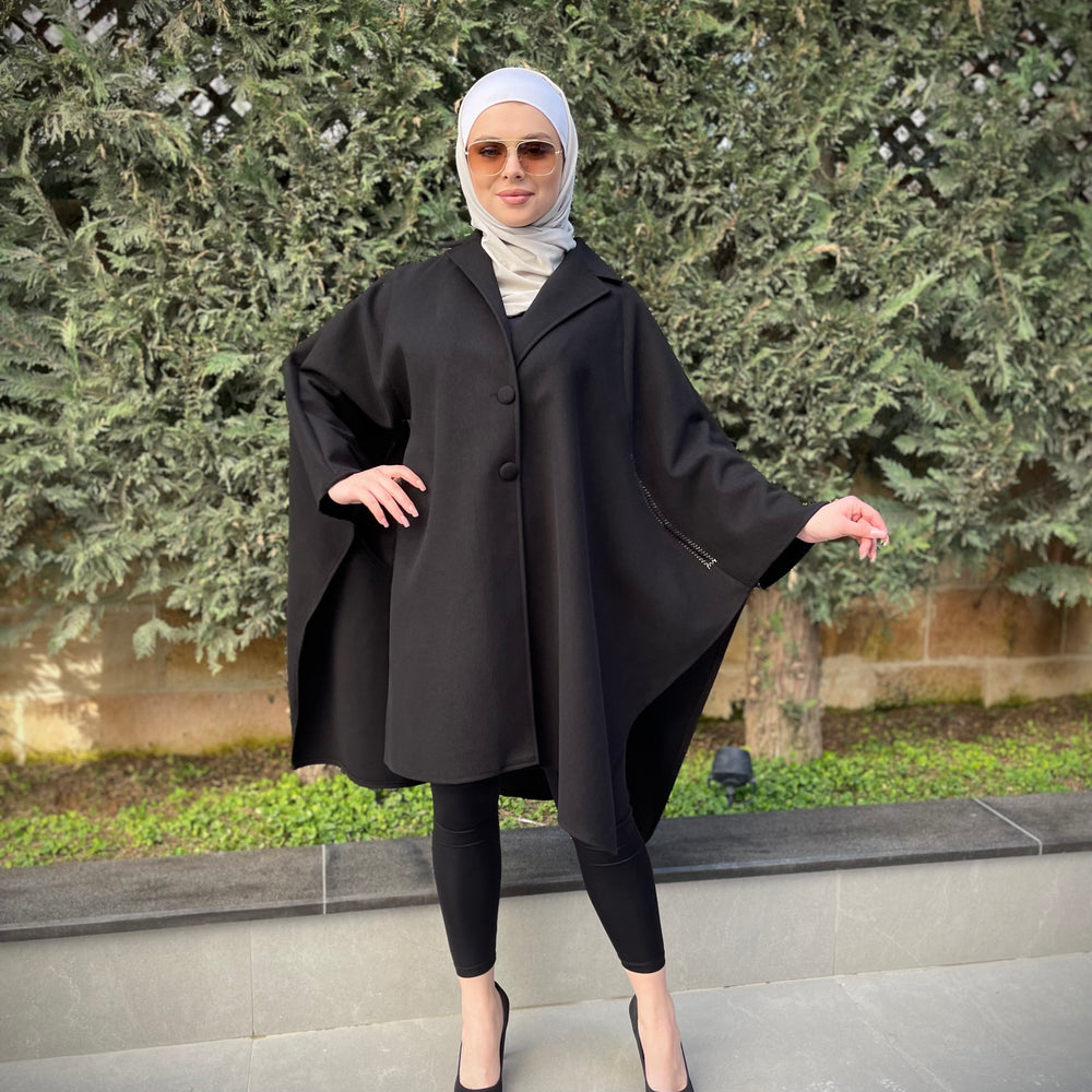 
                  
                    Elegant Wool Cape with Subtle Embroidery
                  
                